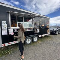 My friend Lacy (nonvegan) confirming that those doughnuts were vegan bc she just couldn’t believe it!  at Rollin' Dough - temporarily closed in Homer