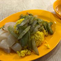 Turmeric rice with steamed radish, stir fried celery and bittergourd at Kwan Inn Vegetarian 观音斋 - Chinatown in Central Singapore