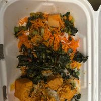 Leftover—collards, tofu curry, and African dirt rice (I never remember to take a pic before digging in).  at Chef Safari's African Fusion in Durango
