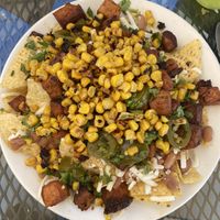 Nachos elote with Al pastor tofu  at J and R Tacos in Merced