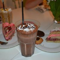 A selection of cakes and a choclate split latte at Cakes 'N' Treats in North West London