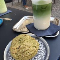 Matcha macadamia vegan cookie & oat milk matcha latte  at Der Keks in Berlin
