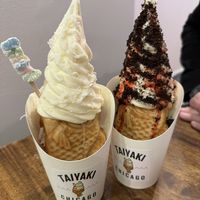 Vanilla vegan taiyaki. Rainbow mochi and coconut flake topping on the left, strawberry and Oreo topping on the right   at Taiyaki in Chicago