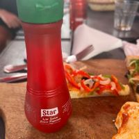 This sauce is vegan and is amazing a cross between ketchup and tobasco, its a brand from Tunisia at Agha Acham in Rabat