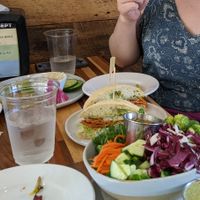 Roasted veggie sandwich and salad with microgreens. at Green Scene Eatery & Market in Walker