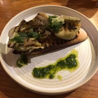 grilled sourdough with marinated artichokes and herb oil at Alverne in Penzance