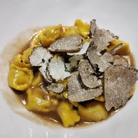 Plin pasta topped with truffle shavings at Soul Kitchen - Creatività Vegetale in Turin