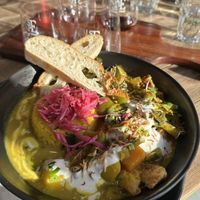 Yellow curry with tofu, pickled cabbage, potato, pumpkin, beans, rice and curry leaves.   at False Cape Wines in Kangaroo Island