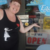 Showing the HappyCow Decal of Excellence window sticker I had just put on!!  at Starry Lane Bakery in San Diego