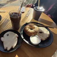 ghost cookie, hazelnut and mocha latte, and sesame seed bagel with vegan cream cheese  at Loaves and Witches in Chicago
