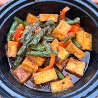 Pad Prik King. I love the lime leaves and curry sauce. Best with brown rice at Khan Toke in Denver