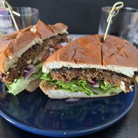 Homemade Vegan Patty made with mushrooms and roasted red peppers, and homemade vegan avocado yogurt saucee  at The Patio  in Providence