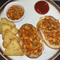 Beans on toast and hash browns  at Mad Monkey Phnom Penh in Phnom Penh