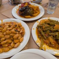 Apologies for the messiness - we may have started eating before I took the photo! 
Stuffed peppers and potatoes, green beans and potatoes and giant beans. at Tzivras in Kefalonia