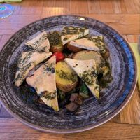 Tofu with basil oil, potatoes and grilled vegies at Aroma Restaurant & Pizzeria in Ljubljana