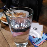 Glass of water (October 2025) at Caffè Nero in Aberystwyth