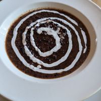 Black rice pudding with coconut cream at Warung Agung Amed in Abang
