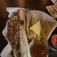 Chili cheeze hotdog with nachos and sauces    at 19:77 - VEGAN:DINER+BAR, Home of RAMONES MUSEUM in Berlin