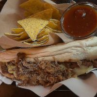 Chili cheese dog  at 19:77 - VEGAN:DINER+BAR, Home of RAMONES MUSEUM in Berlin