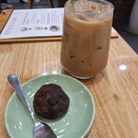 Salted caramel latte and the tiniest cookie of my life at Grazie's Kitchen - Vegan Bakery and Cafe in Da Nang