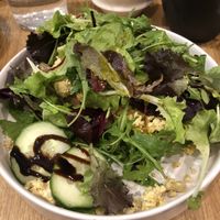 tofu scramble open face sandwich topped with salad leaves   at Café marais in Konstanz