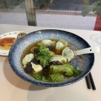Mushroom dumplings in a broth   at XinAn Vegan - 心安素食 in Guangzhou