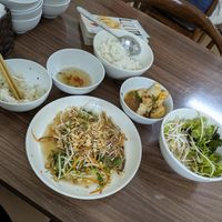 Big plate is banana flower salad I ordered, rest is FREE starter at Katze in Hanoi
