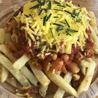 Vegan bean chilli with fries and vegan cheese   at The Lookout Cafe in Weymouth