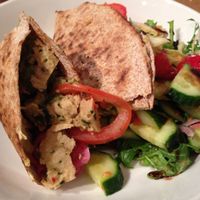 Incredibly delicious toasted chicken wrap with herbed mayonnaise and gooey cheese, served with a side of tasty coleslaw and green salad. A must-try!  at Black Cat in East London
