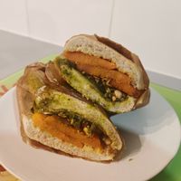 September 2024, week sandwich :  
poached sweet potatoes with curry
chimichurri
jalapeno pikle
Creamy avocado
roasted cashews
pomegranate at CURB STREET FOOD in Paris