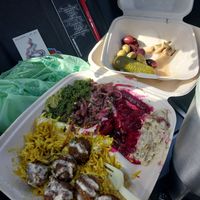 Falafel plate and pickles and olives.  I already ate a bunch of the pickles and olives the portion is bigger than pucture..... at Falafelove in Eureka