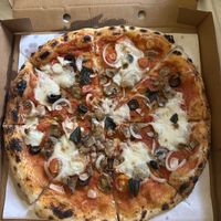 Mushroom onions, and olives  at Canvas V in New Delhi