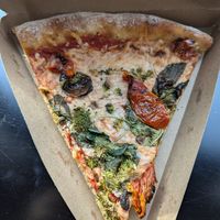 Vegan pizza slice at Whole Foods Market  in Weehawken