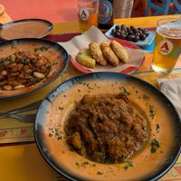 Potato curry and gigantes beans with bread and olives at Tranquilo in Santorini