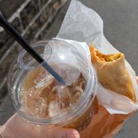 Veggie samosa and fizzy peach tea at Puck & Pollen in Sheffield