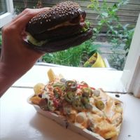 Loaded fries and burger with garlic sauce and pickles at Vegan Burger Brothers - Cloud Kitchen in Groningen