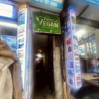 Somewhat hidden sign then walk down an alley  at Hem Vegan in Hanoi