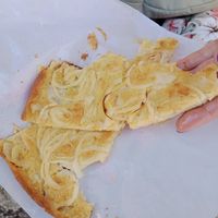 (half eaten bcs it smelled so good and I forgot to take a pic) at Fugassa & Faina in Riomaggiore