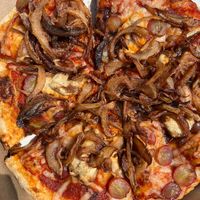 Vegan Tommaso pizza. SO GOOD!!! Those are crispy shoestring onions on top 😋   at Wheat Penny Oven and Bar in Dayton