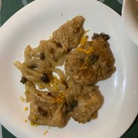 Seitan with onion and orange zest   at Cibo in Aosta