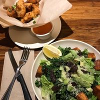 Kale Caesar and fried cauliflower  at Next Level Veggie Grill - Downtown in Seattle