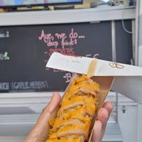 seitan sausage + vegan mozarella corndog with vegan smokey bacon sauce + sriracha mayo at K & K - Food Cart in Vienna