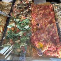 Top left mushroom and sundried tomatoes. Bottom left pesto and artichokes. Right “rossa” only tomato sauce and spices  at La Fermata de Sarrià in Barcelona