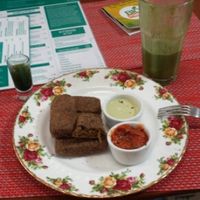 wheatgrass shot, green juice, and carrot things.  at Raw Cafe in Lima