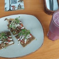 Portobello mushrooms with raw crackers and berry shake at Raw Cafe in Lima