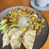 This pan de maiz muy rico tambien   at Raw Cafe in Lima