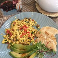 Scrambled tofu, avocado and corn bread  at Raw Cafe in Lima
