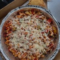 vegan sun setter mac with bread piece  at Zaronis Pizza in Oshkosh