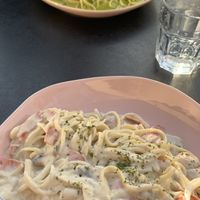 Cabonara pasta (front) and green curry pasta (back) at My Vegan Gold in Los Angeles