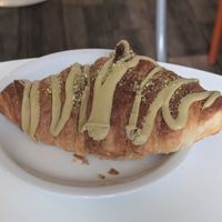 I've never had a croissant this big! Pistachio Friday special at DAMKA • cafè & bakery in Krakow